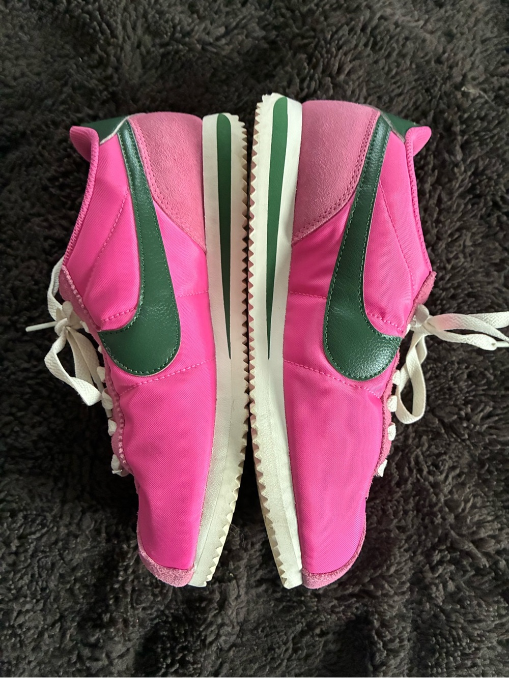Nike Pink Sneakers with Green Swoosh